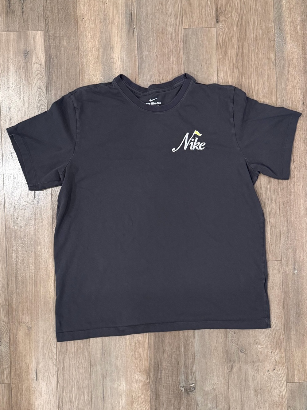 Nike Short Sleeve Crewneck Tee in Black with Small White Logo Golf Flag